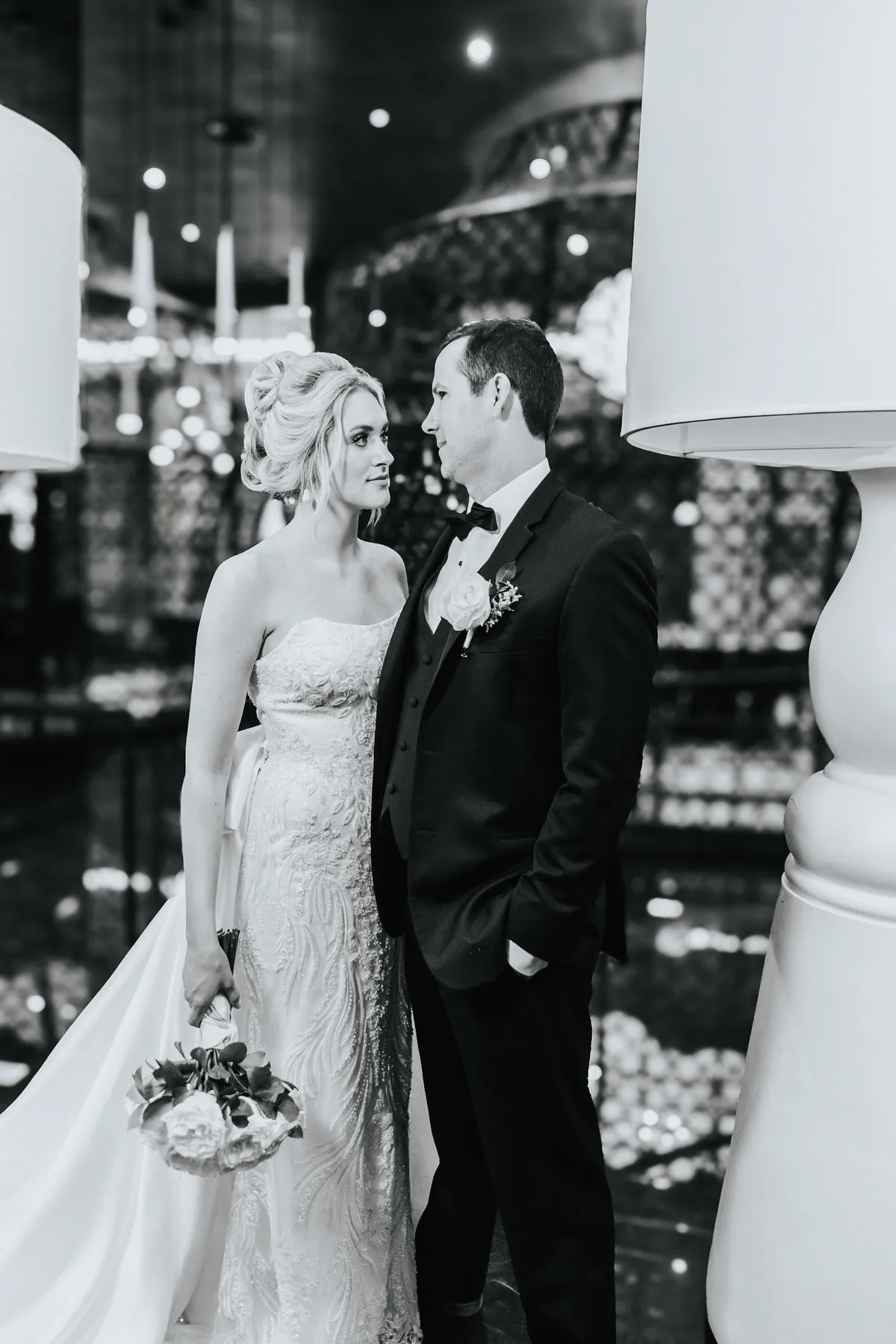 Black and white portrait of the couple looking at each other