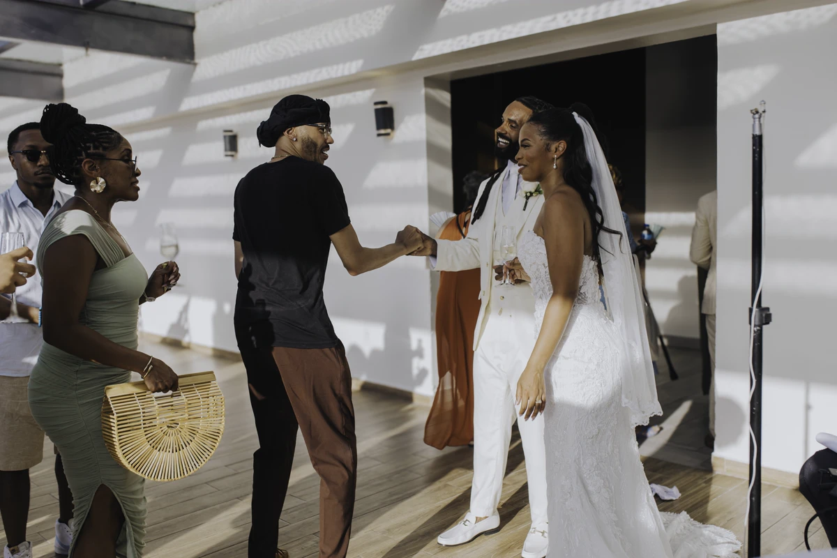 Newlyweds greeting friends during their Punta Cana wedding reception